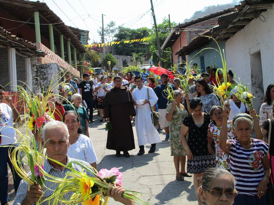 Reenactment of the Way of the Cross, with the youth of the town portraying the biblical characters, moves through the streets of the small settlement of Los Naranjos.