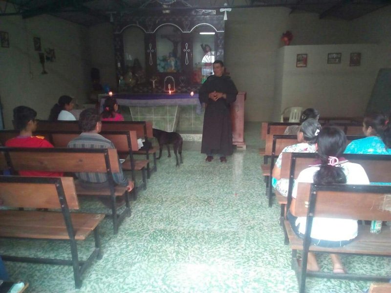 Brother Cecilio Hernandez, O. Carm., giving a reflection on Holy Week to the Catholics in the Santa Cruz